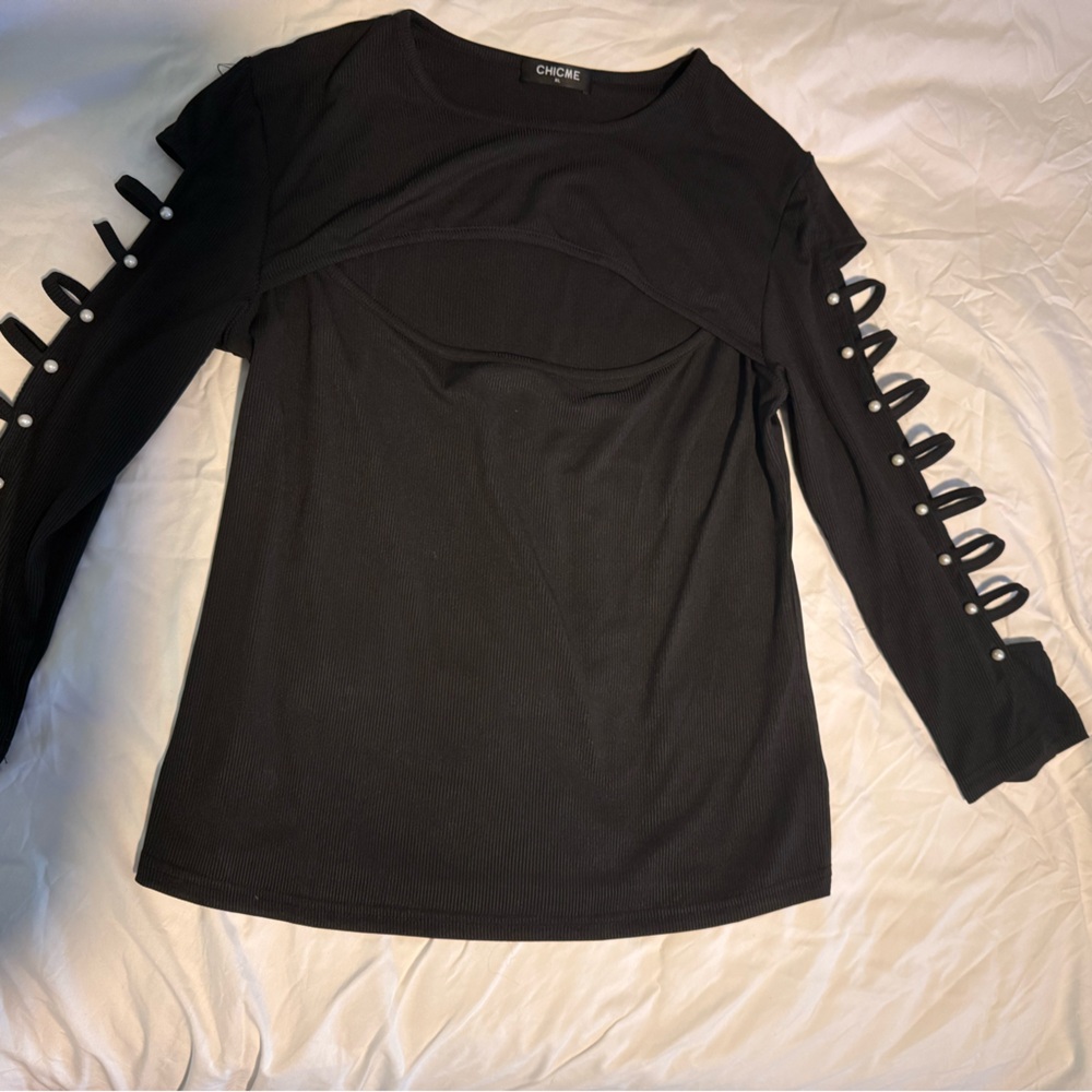 Chic Black Top with Stylish Sleeve Cutouts